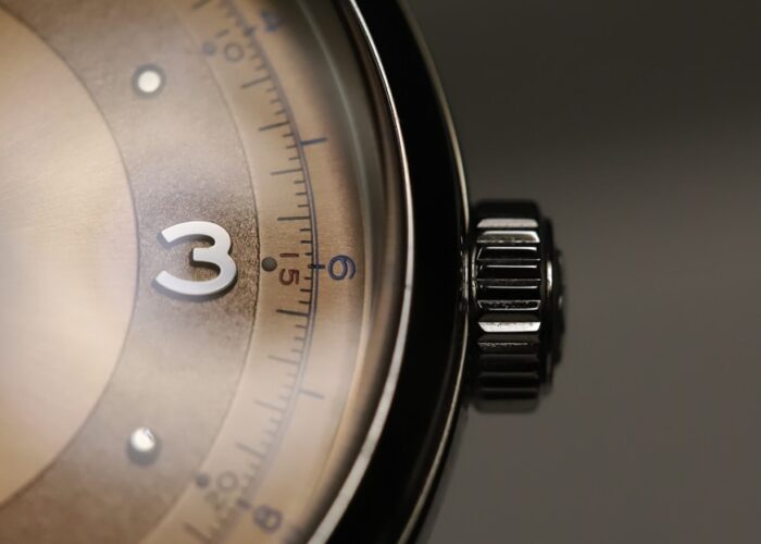 a close up of a watch on a table